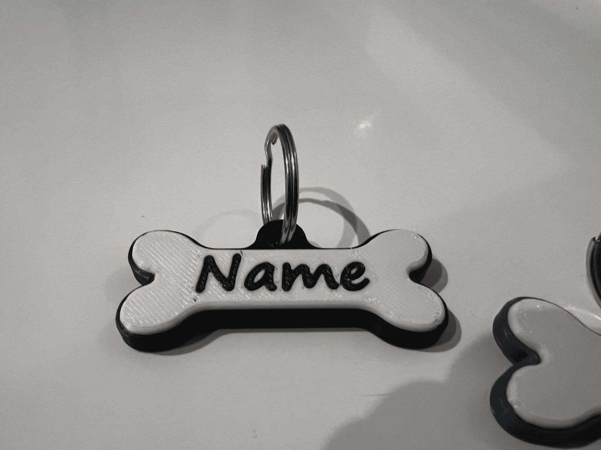 Brelok dla pieska imię + nr telefonu