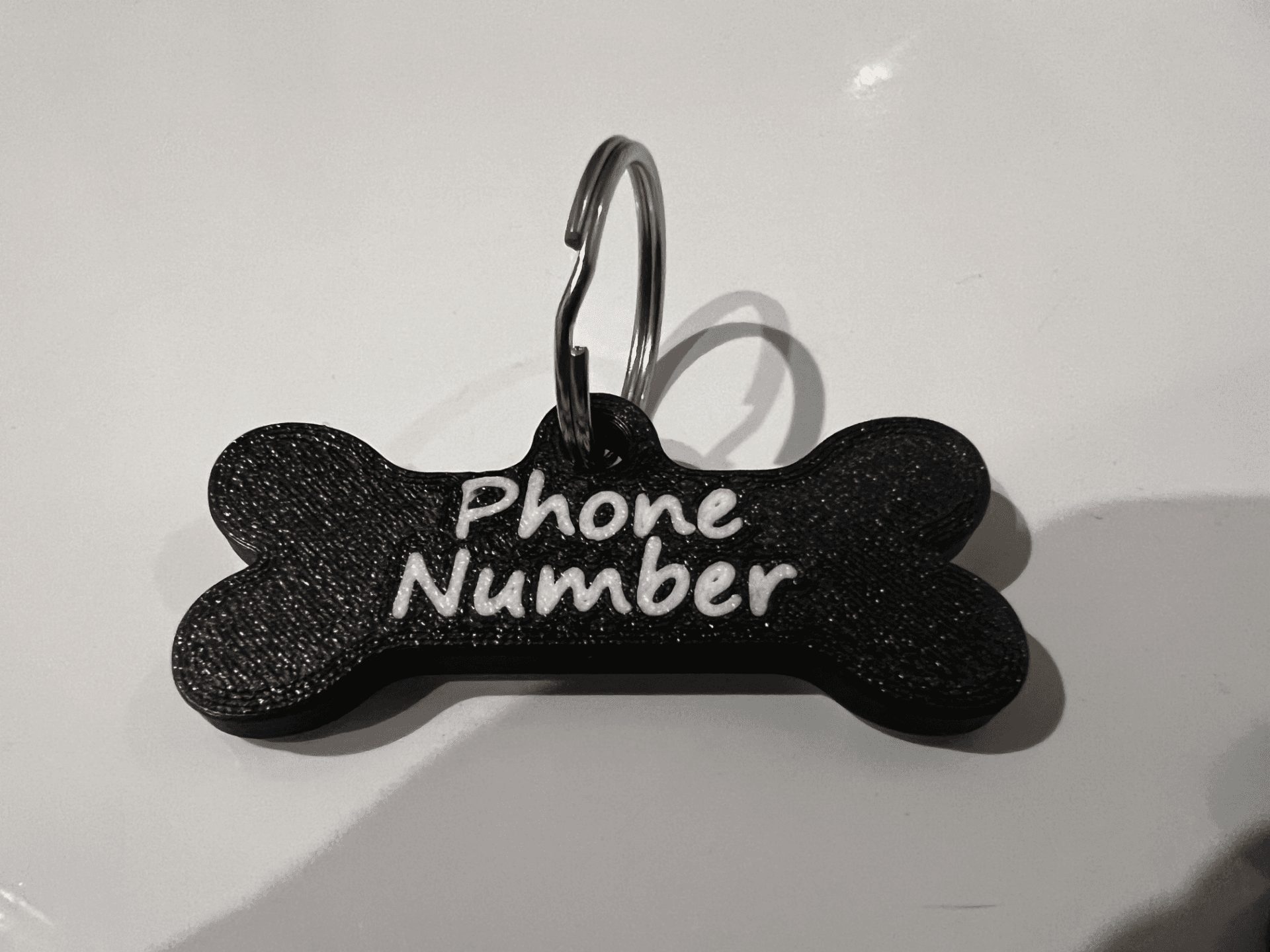 Brelok dla pieska imię + nr telefonu